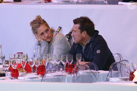 Benjamin Castaldi et sa femme Vanessa Broussouloux - Dîner lors du deuxième jour du Gucci Paris Masters 2014 à Villepinte, près de Paris, le 5 décembre 2014.