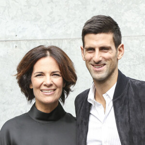 Novak Djokovic et sa femme Jelena Djokovic en compagnie de Roberta Armani au défilé Giorgio Armani à Milan le 23 septembre 2016. Parents de Stefan, né en octobre 2014, ils attendraient leur 2e enfant pour août 2017 selon le tabloïd serbe Blic.