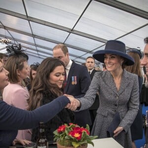 La duchesse Catherine de Cambridge et le prince William ont rencontrés les invités de la réception qui suivait l'inauguration d'un monument à la mémoire des soldats britanniques tombés en Irak et en Afghanistan, à Londres le 9 mars 2017.