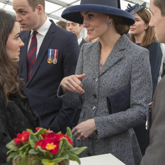 La duchesse Catherine de Cambridge et le prince William ont rencontrés les invités de la réception qui suivait l'inauguration d'un monument à la mémoire des soldats britanniques tombés en Irak et en Afghanistan, à Londres le 9 mars 2017.