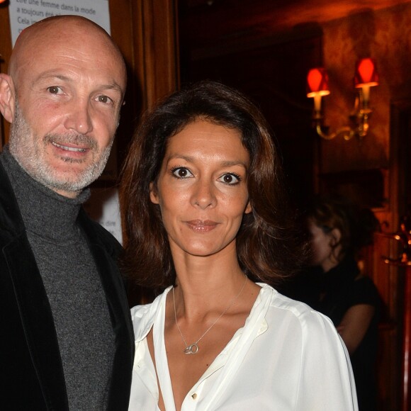 Frank Leboeuf et sa compagne Chrislaure Nollet au Cocktail de lancement du livre "Garde-Robes" de Nathalie Garçon à l'Hôtel Régina à Paris, le 13 octobre 2014.