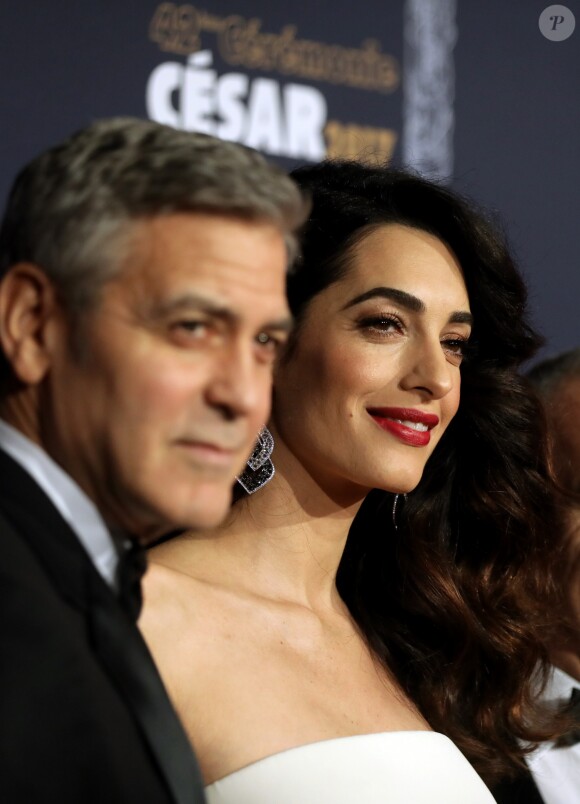 George Clooney et son épouse Amal Clooney - Photocall de la 42ème cérémonie des Cesar à la salle Pleyel à Paris, le 24 février 2017.