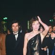  Jane Birkin entourée de son compagnon Jacques Doillon et son frère Andrew Birkin au Festival de Cannes en mai 1984. 