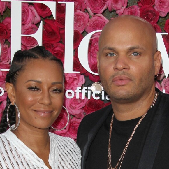 Mel B (Melanie Brown) et son mari Stephen Belafonte à la première de Mother's Day (Fête des mères) au théâtre The TCL Chinese à Hollywood, le 13 avril 2016.