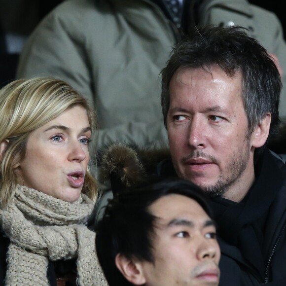 Jean-Luc Lemoine et sa compagne Adeline - People lors du match de football PSG contre Lille au parc des Princes a Paris le 22 décembre 2013.
