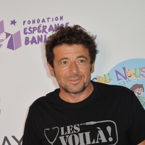 Patrick Bruel à la 12ème édition du "BGC Charity Day" à Paris, le 12 septembre 2016, en mémoire aux 658 collaborateurs du groupe BGC Partners (leader mondial du courtage interbancaire) disparus il y a 15 ans dans les attentats du World Trade Center du 11 septembre 2001. Les people sont courtier d'un jour pour encourager les clients à passer ce jour là le maximum d'ordres dans la salle des marchés d'Aurel BGC au 62, rue de Richelieu 75002 Paris. Chaque 11 septembre, la totalité du chiffre d'affaire réalisé par le groupe sera reversée à des associations. © Veeren / Bestimage