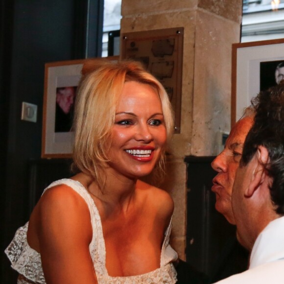Exclusif - Pamela Anderson, Massimo Gargia et le chef Christophe Leroy - L'actrice américaine Pamela Anderson organisait au restaurant "Leroy's Paris", un dîner au profit de la Pamela Anderson Foundation à Paris le 4 mai 2017.