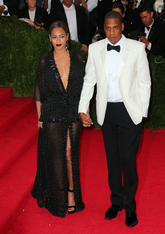 Jay-Z et sa femme Beyonce Knowles à la Soirée du Met Ball / Costume Institute Gala 2014: "Charles James: Beyond Fashion" à New York le 5 mai 2014.