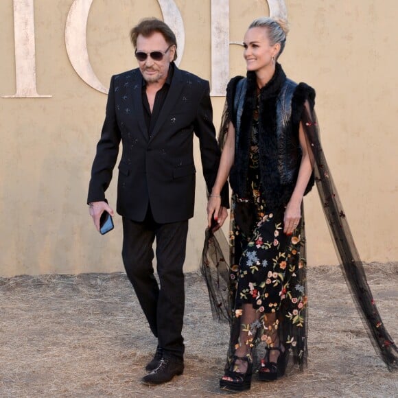 Johnny et Laeticia Hallyday assistent au défilé Christian Dior (collection croisière 2018) à Calabasas. Le 11 mai 2017.