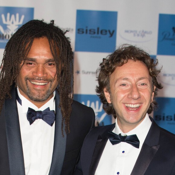 Christian Karembeu et Stephane Bern - Diner de gala annuel de charite MONAA (Monaco Against Autism) au Sporting Club de Monaco. Le 15 Novembre 2013.