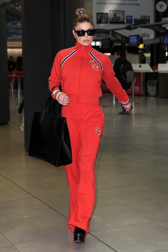 Fergie arrive à Milan à l'occasion de la Fashion Week à Milan le 25 février 2017.