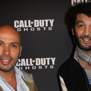 Eric Judor et Ramzy Bedia - Soiree de lancement du jeu "Call of Duty Ghost" au Palais de Tokyo à Paris le 4 novembre 2013.