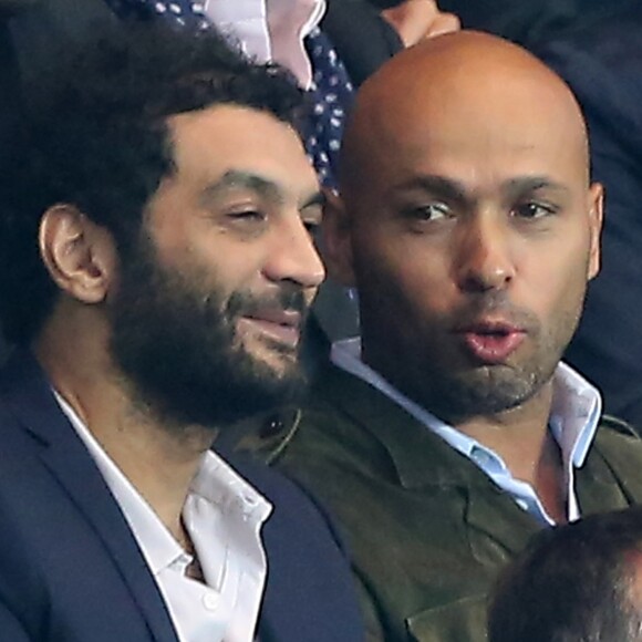 Eric Judor et Ramzy Bedia - People au match de Champions League entre le Psg et le Benfica au parc des princes a Paris le 2 octobre 2013.