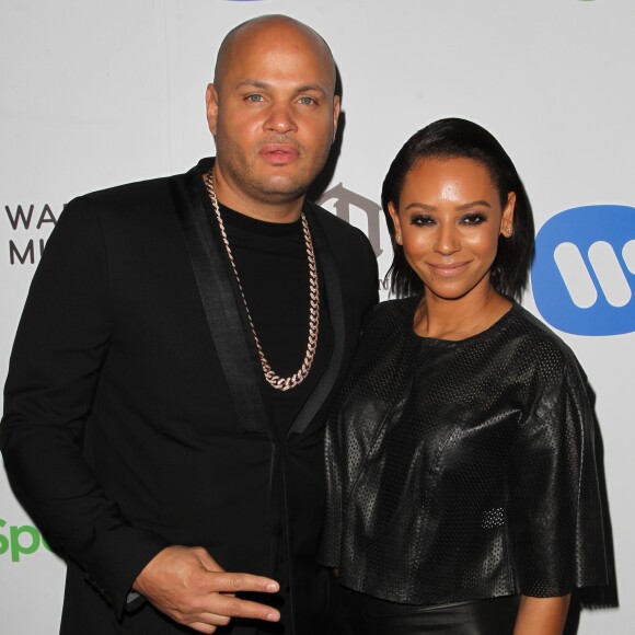 Melanie Brown (Mel B) et son mari Stephen Belafonte à la Soirée de Warner Music Group lors des Grammy Awards au Chateau Marmont à Los Angeles, le 8 février 2015.