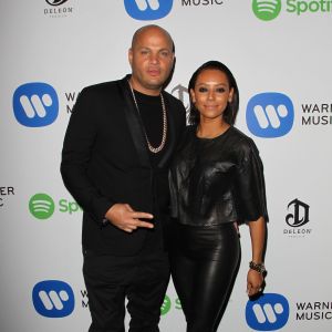 Melanie Brown (Mel B) et son mari Stephen Belafonte à la Soirée de Warner Music Group lors des Grammy Awards au Chateau Marmont à Los Angeles, le 8 février 2015.