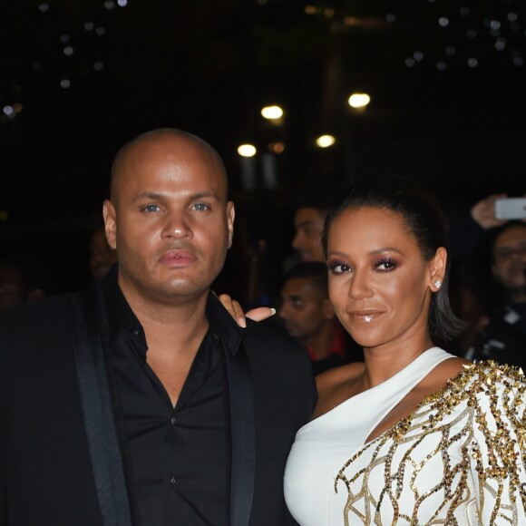 Mel B ((Melanie Brown)) (robe Julien MacDonald) et son mari Stephen Belafonte à la soirée "Mobo Awards 2014" à Londres, le 22 octobre 2014