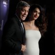 George Clooney (montre Omega) et sa femme Amal Alamuddin-Clooney (enceinte) - Photocall de la 42e cérémonie des Cesar à la salle Pleyel à Paris, le 24 février 2017. © Dominique Jacovides - Olivier Borde / Bestimage