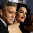 George Clooney (montre Omega) et sa femme Amal Alamuddin-Clooney (enceinte) - Photocall de la 42e cérémonie des Cesar à la salle Pleyel à Paris, le 24 février 2017. © Dominique Jacovides - Olivier Borde / Bestimage