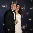 George Clooney (montre Omega) et sa femme Amal Alamuddin-Clooney (enceinte) arrivant à la 42e cérémonie des César à la Salle Pleyel à Paris le 24 février 2017. © Olivier Borde / Dominique Jacovides / Bestimage