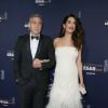 George Clooney (montre Omega) et sa femme Amal Alamuddin-Clooney (enceinte) arrivant à la 42ème cérémonie des César à la Salle Pleyel à Paris le 24 février 2017. © Olivier Borde / Dominique Jacovides / Bestimage