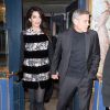 George Clooney et sa femme Amal Alamuddin, enceinte et vêtue d'un manteau (pré-collection automne 2017) et de bottes Giambattista Valli, quittent restaurant Lapérouse à Paris, le 25 février 2017.