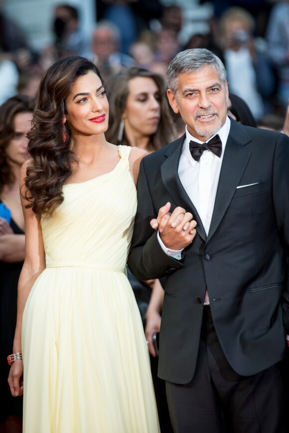 George Clooney et sa femme Amal Alamuddin Clooney (bijoux Cartier) - Montée des marches du film "Money Monster" lors du 69e Festival International du Film de Cannes. Le 12 mai 2016. © Borde-Jacovides-Moreau/Bestimage
