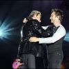 Exclusif - Johnny et son fils David sur la scène du Stade Vélodrome lors de la tournée "Tour 66", le 11 juillet 2009.
