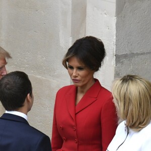 Melania Trump et Brigitte Macron (Trogneux), avec Donald Trump et Emmanuel Macron - Cérémonie d'accueil du président Donald Trump par Emmanuel Macron, président de la République, à l'Hôtel National des Invalides à Paris le 13 juillet 2017. © Pierre Perusseau / Bestimage