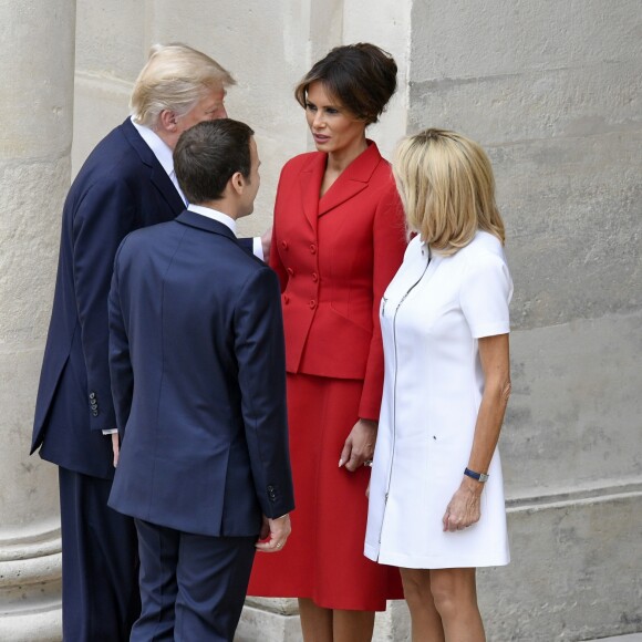 Melania Trump et Brigitte Macron (Trogneux), avec Donald Trump et Emmanuel Macron - Cérémonie d'accueil du président Donald Trump par Emmanuel Macron, président de la République, à l'Hôtel National des Invalides à Paris le 13 juillet 2017. © Pierre Perusseau / Bestimage