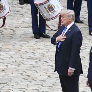 Donald Trump par Emmanuel Macron à l'Hôtel National des Invalides à Paris le 13 juillet 2017. © Pierre Perusseau / Bestimage