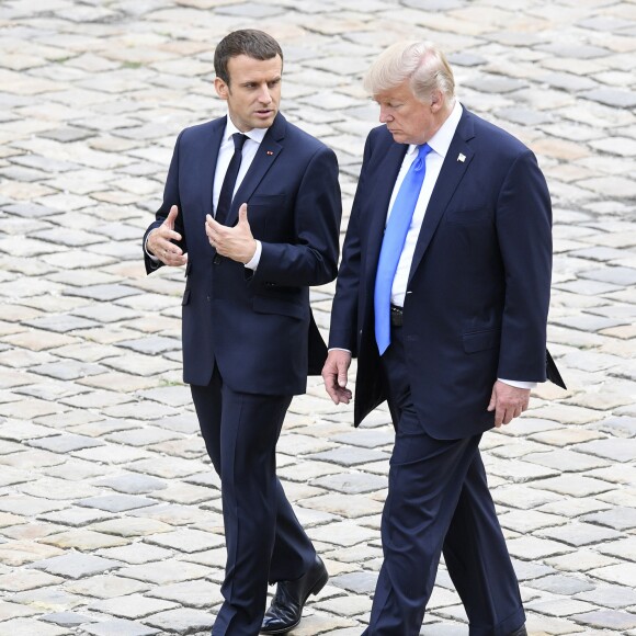 Donald Trump par Emmanuel Macron à l'Hôtel National des Invalides à Paris le 13 juillet 2017. © Pierre Perusseau / Bestimage