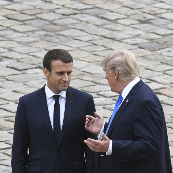 Donald Trump par Emmanuel Macron à l'Hôtel National des Invalides à Paris le 13 juillet 2017. © Pierre Perusseau / Bestimage