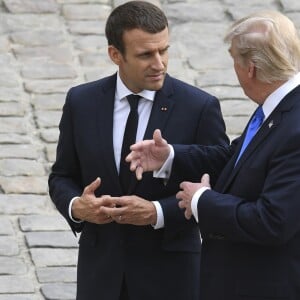 Donald Trump par Emmanuel Macron à l'Hôtel National des Invalides à Paris le 13 juillet 2017. © Pierre Perusseau / Bestimage