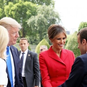 Le président de la République Emmanuel Macron, sa femme Brigitte Trogneux, le président des Etats-Unis Donald Trump et sa femme Melania Trump lors de la cérémonie d'accueil du président des Etats-Unis à l'Hôtel National des Invalides à Paris le 13 juillet 2017. © Dominique Jacovides/Bestimage