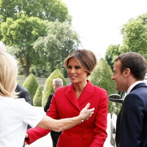 Le président de la République Emmanuel Macron, sa femme Brigitte Trogneux, le président des Etats-Unis Donald Trump et sa femme Melania Trump lors de la cérémonie d'accueil du président des Etats-Unis à l'Hôtel National des Invalides à Paris le 13 juillet 2017. © Dominique Jacovides/Bestimage