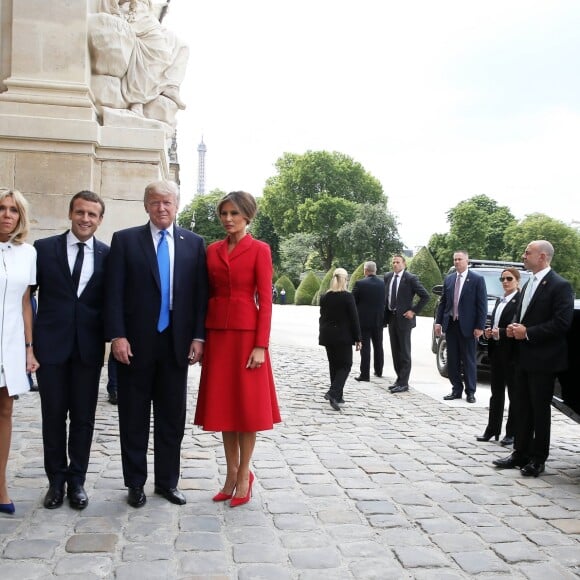 Le président de la République Emmanuel Macron, sa femme Brigitte Trogneux, le président des Etats-Unis Donald Trump et sa femme Melania Trump lors de la cérémonie d'accueil du président des Etats-Unis à l'Hôtel National des Invalides à Paris le 13 juillet 2017. © Dominique Jacovides/Bestimage