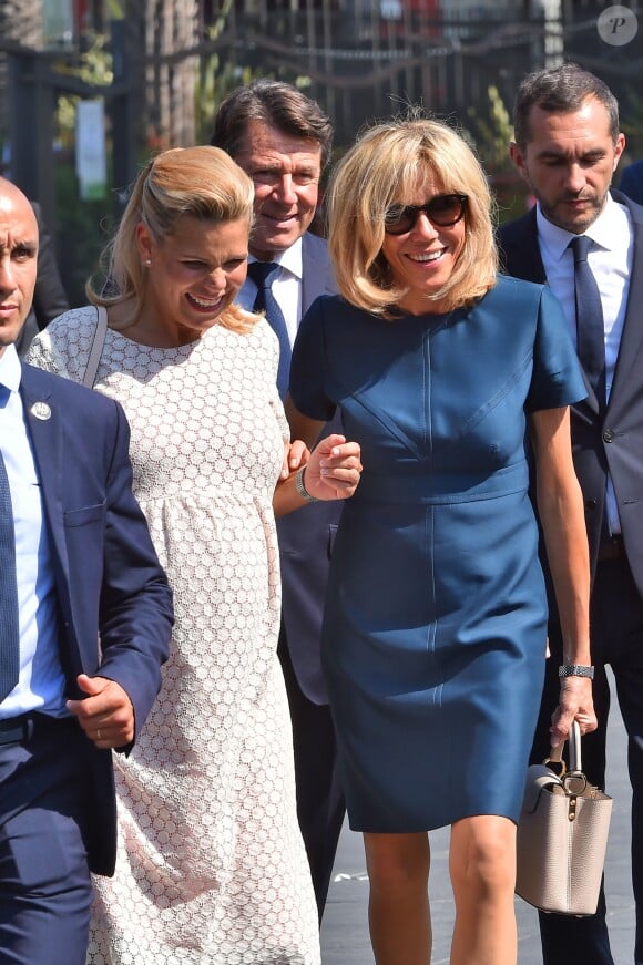 Laura Tenoudji (enceinte), son mari Christian Estrosi, le maire de Nice et Brigitte Macron (Trogneux) lors de la cérémonie d'hommage aux victimes de l'attentat du 14 juillet 2016 à Nice, le 14 juillet 2017. © Bruno Bébert/Bestimage