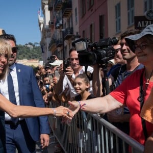 Brigitte Macron (Trogneux) - Le président de la République est reçu par l'hôtel de ville de Nice pour un entretien avant la cérémonie d'hommage aux victimes de l'attentat du 14 juillet 2016 à Nice, le 14 juillet 2017. © Cyril Moreau/Bestimage  French President is received by Mayor of Nice to meeting at the city hall before thecCommemorative ceremony marking the first anniversary of the jihadist truck attack which killed 86 people in Nice, southern France, on Bastille Day, on July 14, 2017.14/07/2017 - Nice