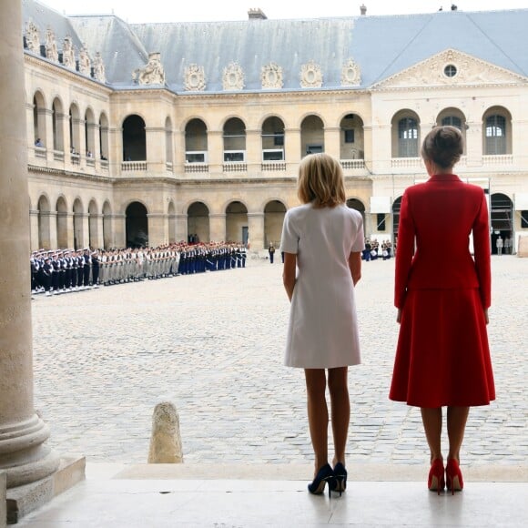 Emmanuel Macron et sa femme Brigitte Macron et Donald Trump et sa femme Melania Trump (habillée en Dior) aux Invalides à Paris, le 13 juillet 2017. © Sébastien Valiela/Dominique Jacovides/Bestimage