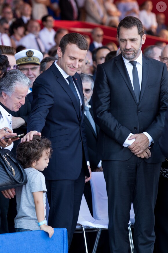 Le président de la République Emmanuel Macron et Christophe Castaner lors de la cérémonie d'hommage aux victimes de l'attentat du 14 juillet 2016 à Nice, le 14 juillet 2017. © Cyril Moreau/Bestimage