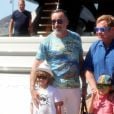 Elton John et son mari David Furnish quittent le club 55 à Saint-Tropez le 12 août 2016. Ils sont avec leurs enfants Elijah et Zachary.