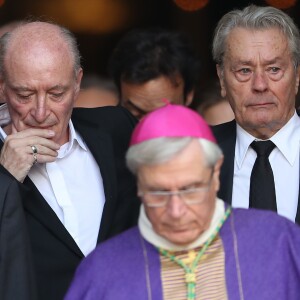 Monseigneur Di Falco, Pascal Desprez et Alain Delon - Sorties des obsèques de Mireille Darc en l'église Saint-Sulpice à Paris. Le 1er septembre 2017