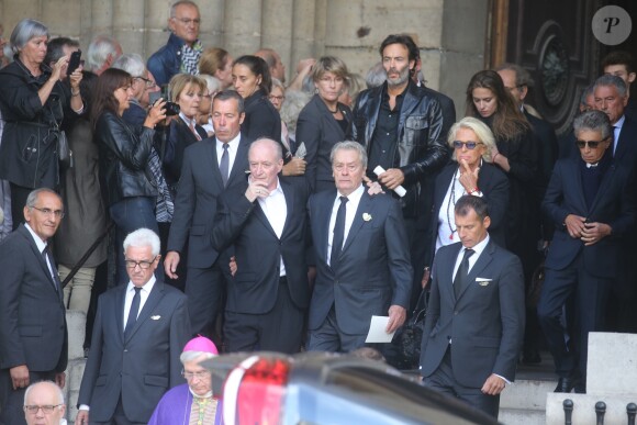 Pascal Desprez et Alain Delon - Sorties des obsèques de Mireille Darc en l'église Saint-Sulpice à Paris. Le 1er septembre 2017