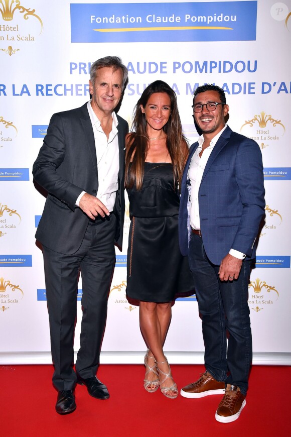 Exclusif - De gauche à droite, Bernard de la Villadière, l'ambassadeur de la Fondation, Emmanuelle Boidron, ambassadrice de la Fondation Claude Pompidou, et Brahim Asloum, parrain de la Fondation Claude Pompidou, lors de la réception en l'honneur de la Fondation Claude Pompidou organisée sur la terrasse panoramique de l'hôtel Aston la Scala à Nice le 8 septembre 2017 dans le cadre de la journée de remise du Prix Claude Pompidou pour la recherche sur la maladie d'Alzheimer doté d'un montant de 100 000 Euros. Cette année, ceux sont les travaux du professeur Buisson qui ont été récompensés. © Bruno Bebert / LMS / Bestimage