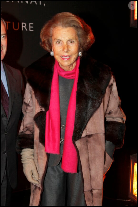 Liliane Bettencourt au Grand Palais à Paris en décembre 2010 pour une exposition dédiée aux bijoux Bulgari.