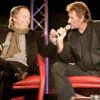 Fabrice Luchini et Johnny Hallyday pour la promotion de leur film "Jean-Philippe" au Grand Rex, à Paris, le 20 mars 2006.