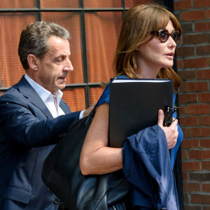 Exclusif - Carla Bruni-Sarkozy et son mari l'ancien Président Nicolas Sarkozy quittent un hôtel de New York le 14 juin 2017.