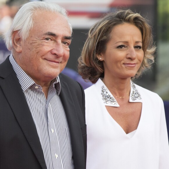 Dominique Strauss-Kahn et sa compagne Myriam L'Aouffir - Avant-première du film "Sin City 2" lors du 40e festival du cinéma américain de Deauville, le 13 septembre 2014.