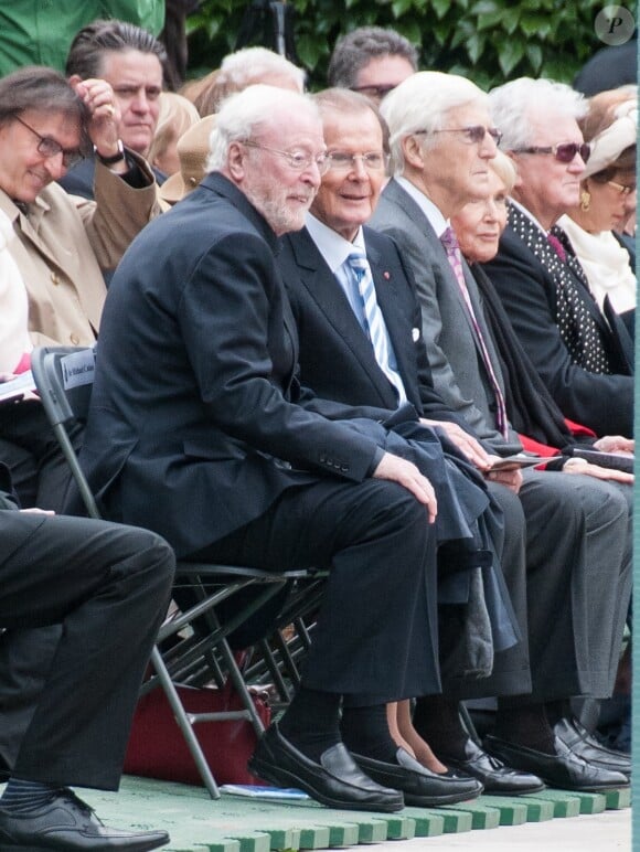 Michael Caine et Roger Moore lors d'un hommage à Michael Winner à Londres le 23 juin 2013, six mois après sa mort des suites d'un cancer du foie.