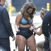 Exclusif - Prix spécial - No Web No Blog - Ashley Graham pose lors d'un shooting à New York le 10 septembre 2017.  09/10/2017 EXCLUSIVE: Ashley Graham is spotted during a photoshoot in New York City. The 29 year old model wore a barely there outfit as she pushed a weight slide down the middle of a street. Graham wore a aqua colored sports bra, tiny black shorts, and high top sneakers.10/09/2017 - New York
